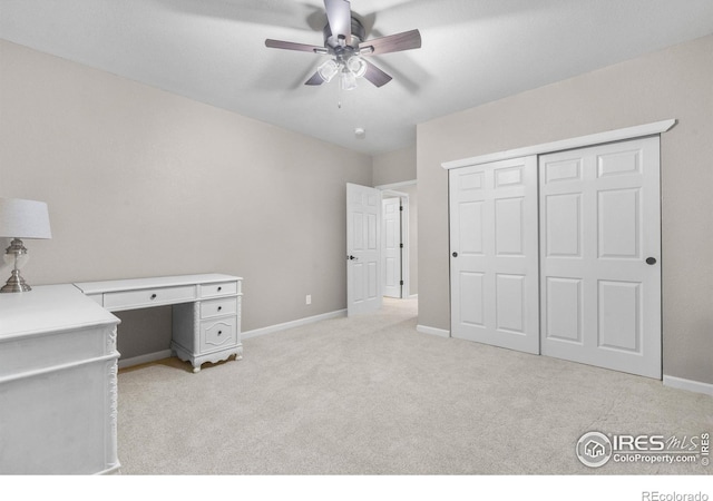 1976 Cayman Dr, Windsor, CO 80550 - unfurnished bedroom featuring light carpet, a closet, a ceiling fan, and an office area