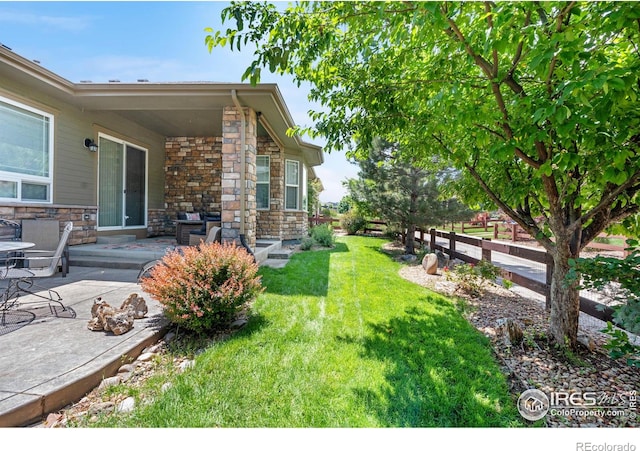 1976 Cayman Dr, Windsor, CO 80550 - view of yard with a patio area