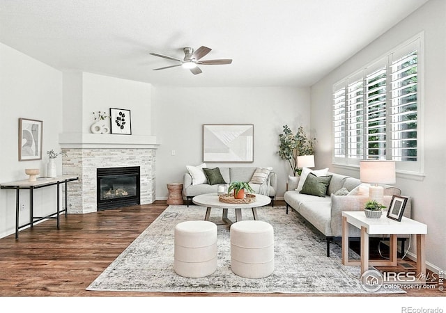 1662 Crestview Ln, Erie, CO 80516 - living area featuring wood finished floors, ceiling fan, and a glass covered fireplace