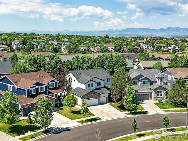 1662 Crestview Ln, Erie, CO 80516 - aerial view of residential area featuring a mountain backdrop