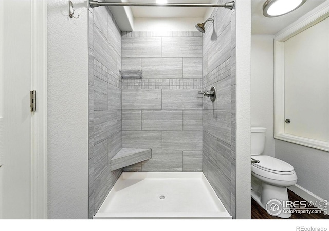 1662 Crestview Ln, Erie, CO 80516 - bathroom featuring toilet and tiled shower