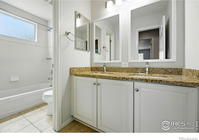 1662 Crestview Ln, Erie, CO 80516 - bathroom with double vanity, tile patterned flooring, and  shower combination