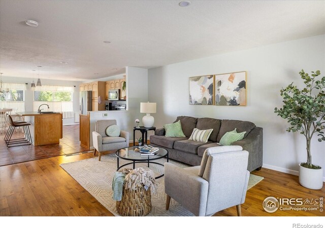 322 W Harper St, Louisville, CO 80027 - living area with wood finished floors