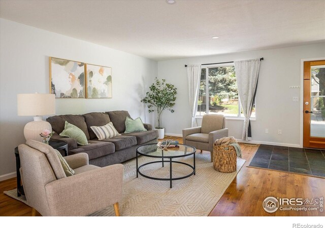 322 W Harper St, Louisville, CO 80027 - living area featuring wood finished floors and recessed lighting