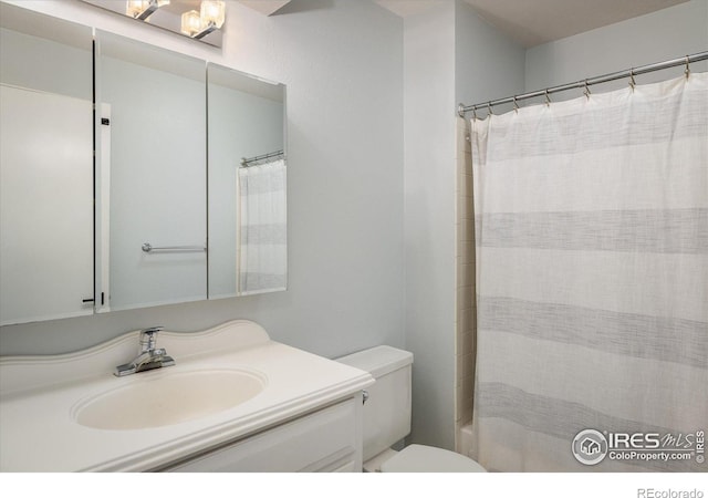 322 W Harper St, Louisville, CO 80027 - full bathroom with vanity and toilet