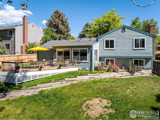 322 W Harper St, Louisville, CO 80027 - back of property with a wooden deck and a chimney