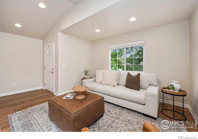 1879 Gemini Ct, Loveland, CO 80537 - living room with wood finished floors, recessed lighting, and vaulted ceiling