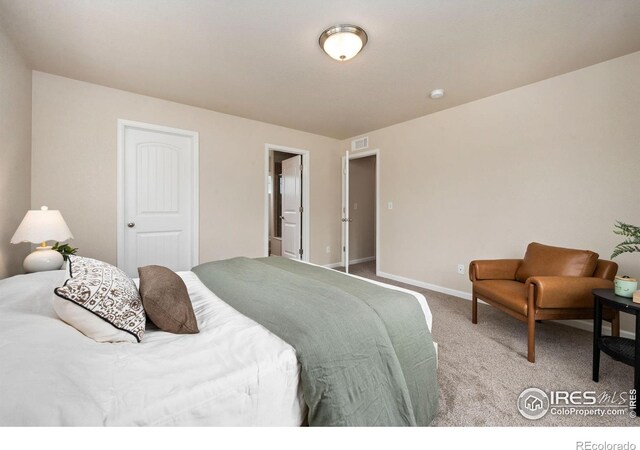 1879 Gemini Ct, Loveland, CO 80537 - carpeted bedroom featuring baseboards