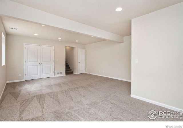 1879 Gemini Ct, Loveland, CO 80537 - basement featuring recessed lighting, carpet floors, and stairs