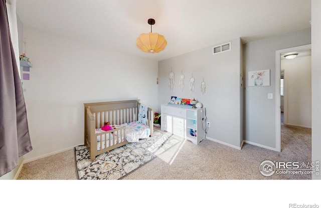 1661 Rise Dr, Windsor, CO 80550 - bedroom with carpet and a nursery area
