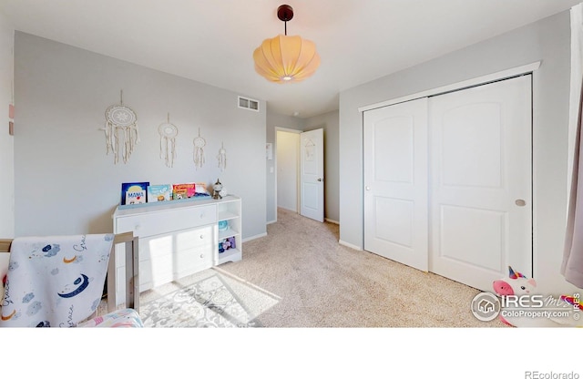 1661 Rise Dr, Windsor, CO 80550 - carpeted bedroom with a closet and baseboards