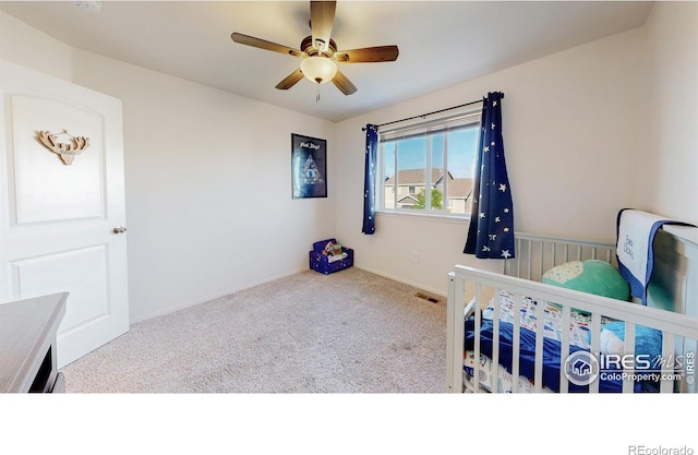 1661 Rise Dr, Windsor, CO 80550 - carpeted bedroom featuring baseboards and ceiling fan