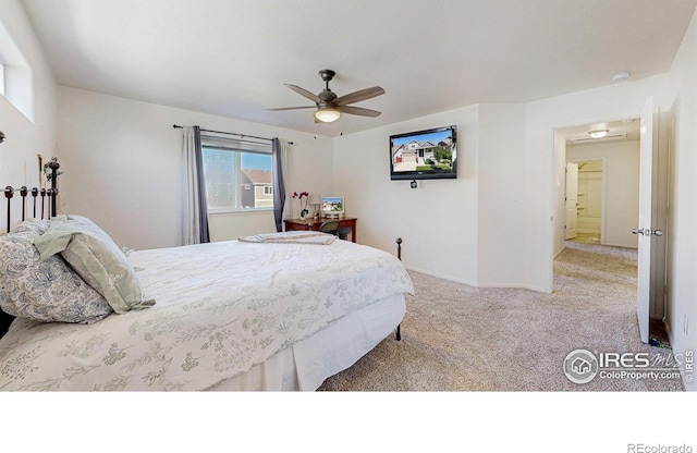 1661 Rise Dr, Windsor, CO 80550 - carpeted bedroom with ceiling fan and baseboards