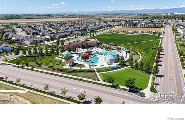 1661 Rise Dr, Windsor, CO 80550 - aerial view of residential area featuring a mountain backdrop