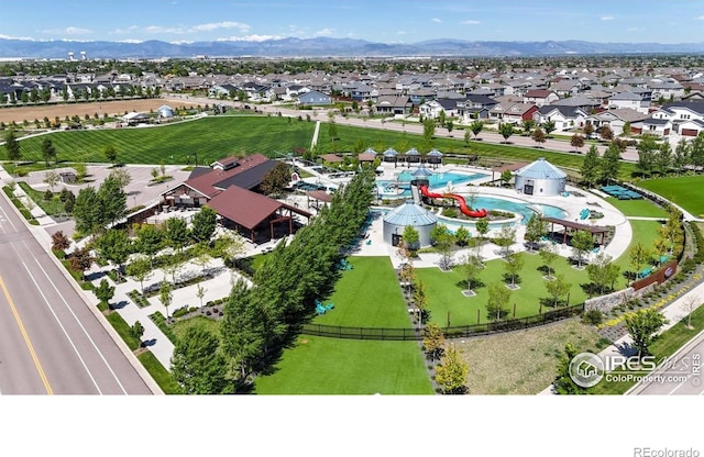 1661 Rise Dr, Windsor, CO 80550 - aerial perspective of suburban area featuring a pool