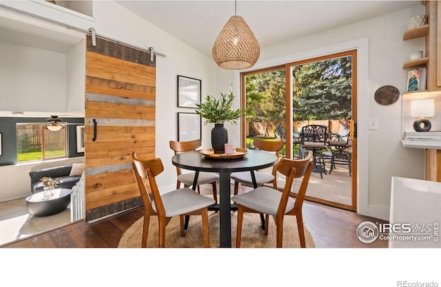 1922 Enfield Ct, Fort Collins, CO 80526 - dining space with wood finished floors and a barn door