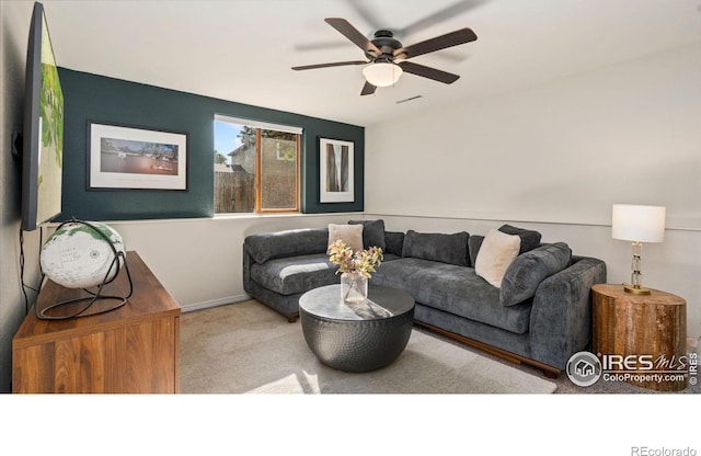 1922 Enfield Ct, Fort Collins, CO 80526 - carpeted living area featuring a ceiling fan and baseboards