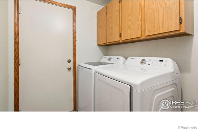 1922 Enfield Ct, Fort Collins, CO 80526 - laundry room with cabinet space and washer and dryer