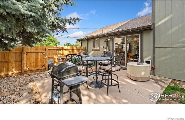 1922 Enfield Ct, Fort Collins, CO 80526 - view of patio / terrace featuring outdoor dining space and grilling area