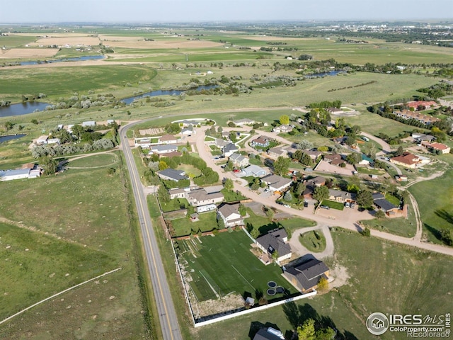 64 Bachar Dr, Fort Morgan, CO 80701 - aerial overview of property's location with a large body of water and nearby suburban area