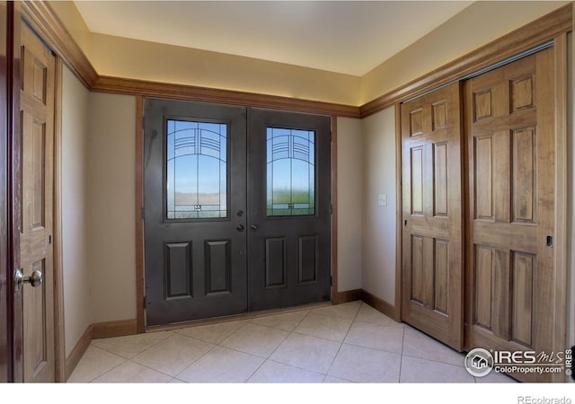 14448 Hanover St, Brighton, CO 80602 - entrance foyer featuring light tile patterned flooring