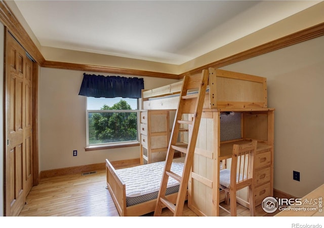 14448 Hanover St, Brighton, CO 80602 - bedroom with baseboards and light wood-type flooring