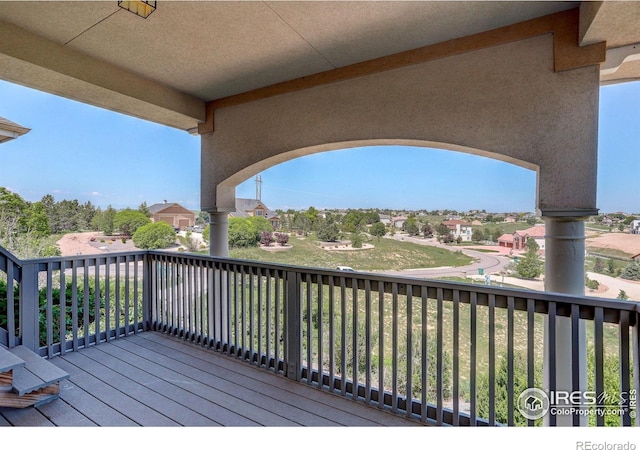 14448 Hanover St, Brighton, CO 80602 - wooden terrace featuring a residential view