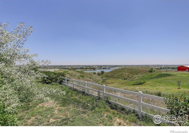 14448 Hanover St, Brighton, CO 80602 - view of yard with a water view