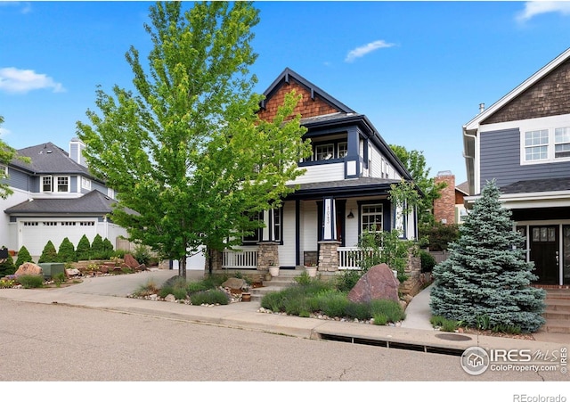 1043 Terrace Cir S, Boulder, CO 80304 - craftsman-style home featuring covered porch and stone siding