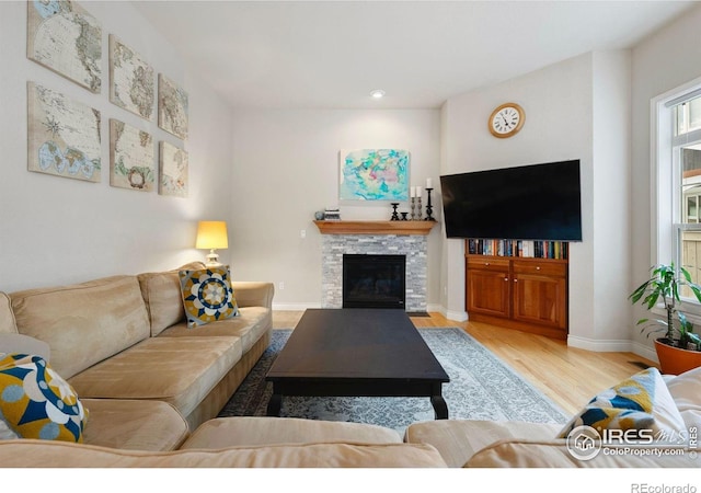 1043 Terrace Cir S, Boulder, CO 80304 - living room featuring wood finished floors, a fireplace, and recessed lighting