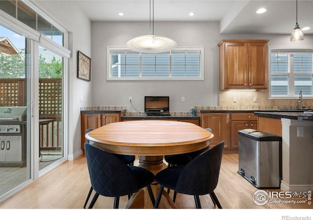1043 Terrace Cir S, Boulder, CO 80304 - dining space with light wood-style flooring, healthy amount of natural light, and recessed lighting
