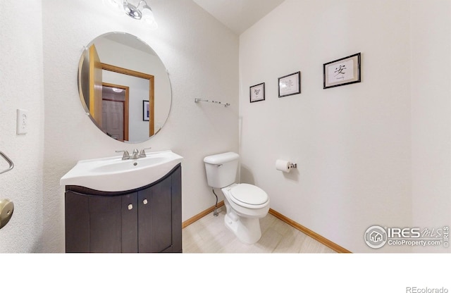 13673 Cook St, Thornton, CO 80602 - bathroom with vanity and toilet