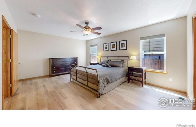 13673 Cook St, Thornton, CO 80602 - bedroom featuring light wood-type flooring and a ceiling fan