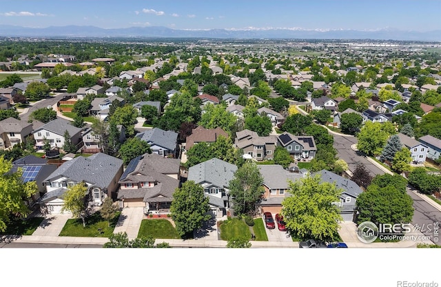 13673 Cook St, Thornton, CO 80602 - aerial view of residential area with a mountain backdrop