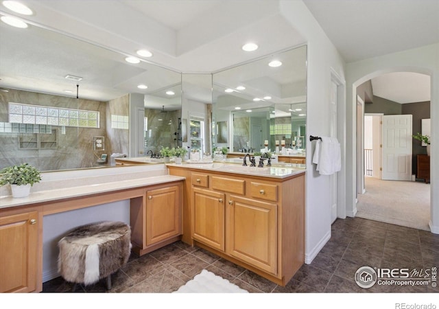 3931 Stonegrass Pt, Broomfield, CO 80023 - bathroom with a walk in shower, vanity, tile patterned flooring, and recessed lighting