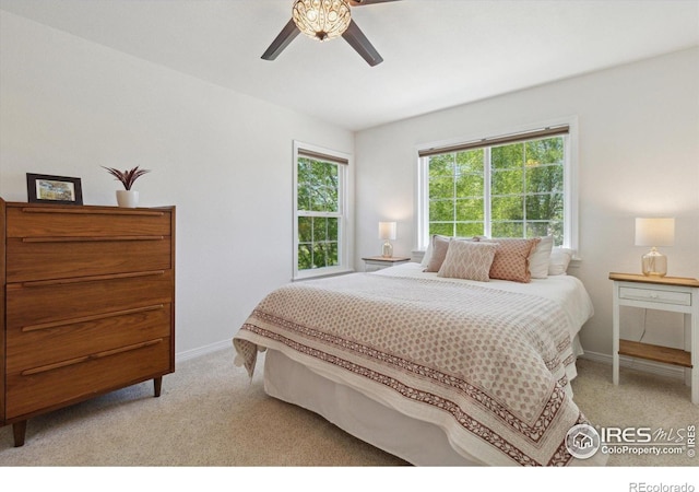 3931 Stonegrass Pt, Broomfield, CO 80023 - bedroom with light carpet and ceiling fan