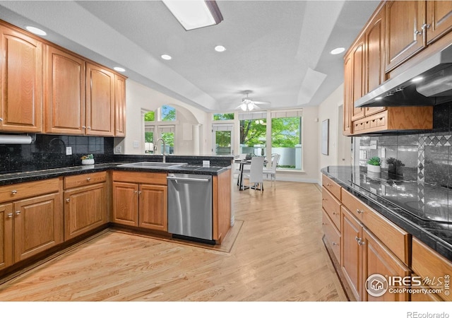 5753 Secrest Ct, Golden, CO 80403 - kitchen featuring stainless steel dishwasher, under cabinet range hood, ceiling fan, black electric cooktop, and recessed lighting