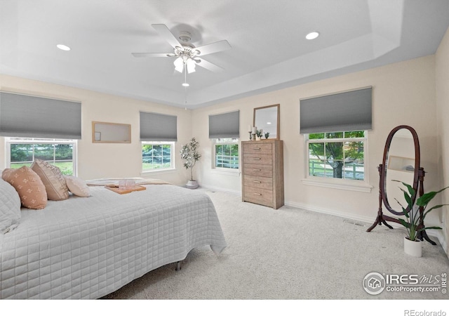 5753 Secrest Ct, Golden, CO 80403 - carpeted bedroom featuring a raised ceiling, recessed lighting, and ceiling fan