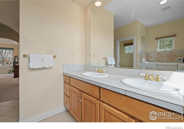 5753 Secrest Ct, Golden, CO 80403 - bathroom with tile patterned flooring and double vanity