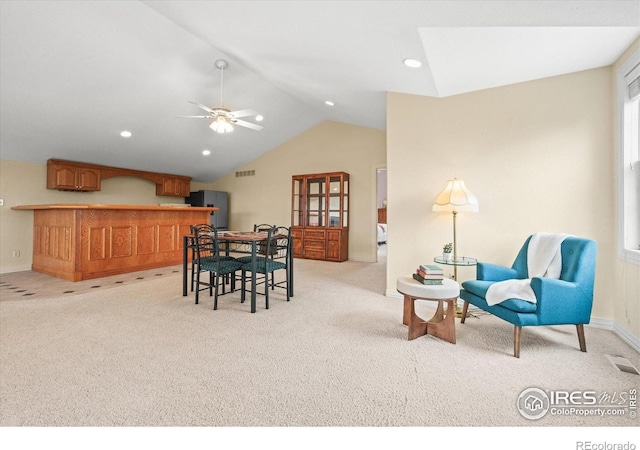 5753 Secrest Ct, Golden, CO 80403 - dining space featuring light carpet, vaulted ceiling, ceiling fan, and recessed lighting