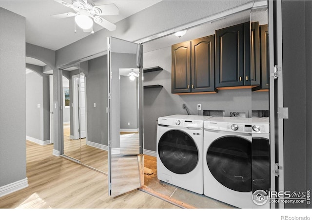5753 Secrest Ct, Golden, CO 80403 - washroom with washing machine and clothes dryer, cabinet space, a ceiling fan, and light wood-style flooring