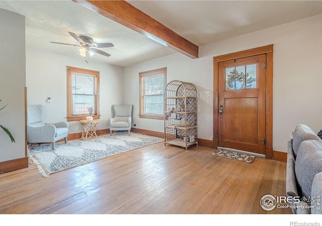 1421 N 7th St, Grand Junction, CO 81501 - entryway with light wood-style flooring, a ceiling fan, and beam ceiling