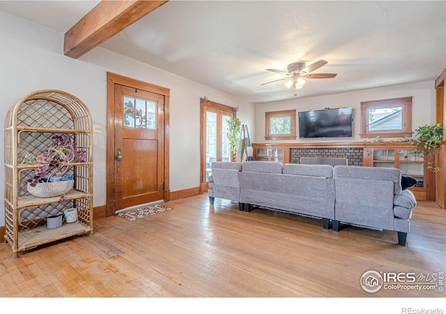 1421 N 7th St, Grand Junction, CO 81501 - living room with a ceiling fan, light wood-type flooring, and beam ceiling