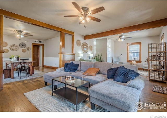 1421 N 7th St, Grand Junction, CO 81501 - living area with ceiling fan, beam ceiling, and hardwood / wood-style flooring