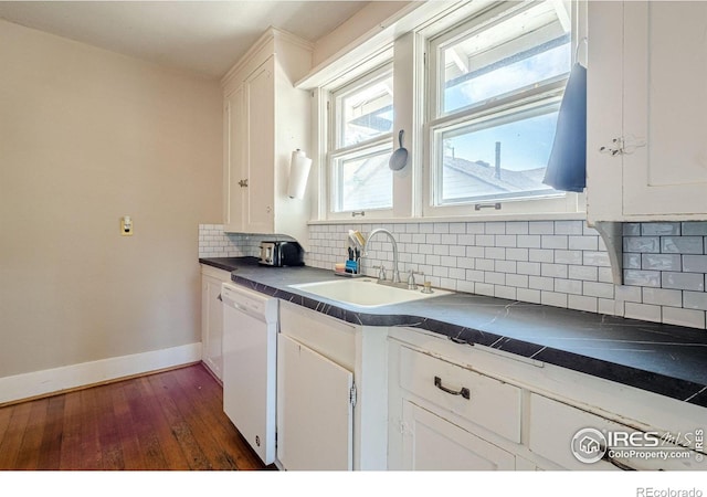 1421 N 7th St, Grand Junction, CO 81501 - kitchen featuring dishwasher, white cabinets, tasteful backsplash, and dark wood finished floors
