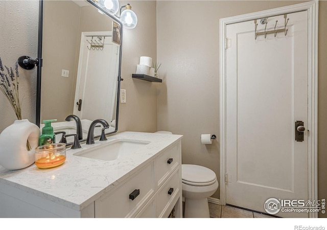 1421 N 7th St, Grand Junction, CO 81501 - bathroom with vanity and tile patterned flooring