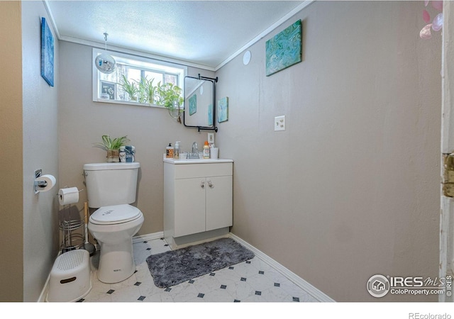 1421 N 7th St, Grand Junction, CO 81501 - bathroom featuring vanity, tile patterned floors, and crown molding