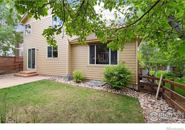 13266 Teller Lake Way, Broomfield, CO 80020 - view of front of property with a patio
