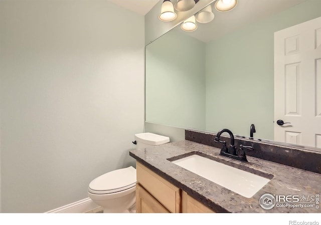 1616 Cedarwood Dr, Longmont, CO 80504 - bathroom with toilet and vanity