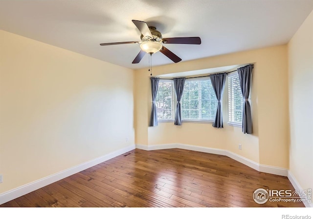 1616 Cedarwood Dr, Longmont, CO 80504 - unfurnished room with ceiling fan and wood-type flooring